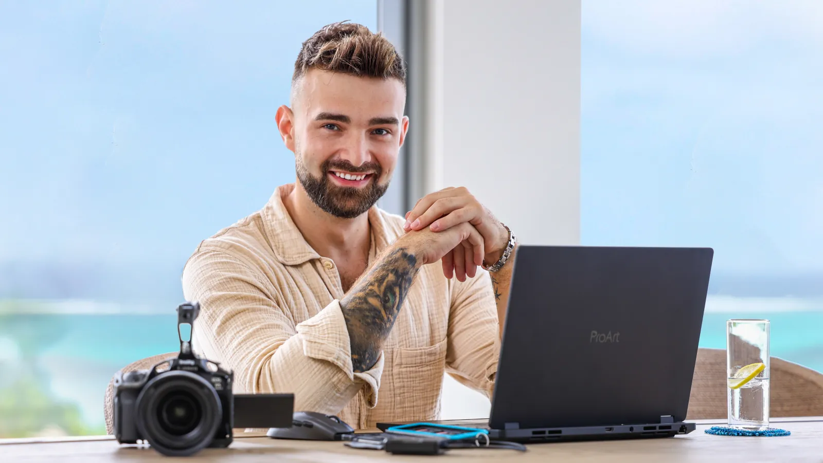 Peter Wagner at the desk with camera, drives and laptop